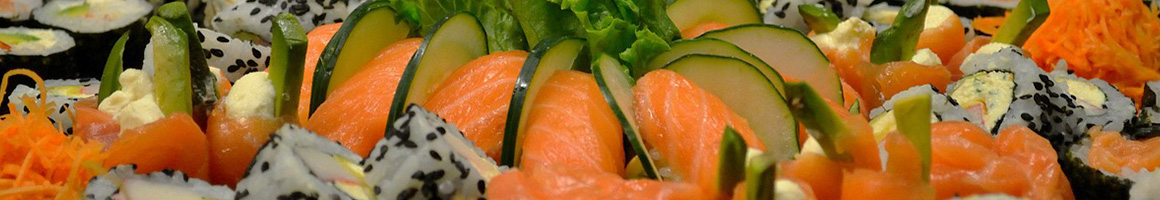 Eating Asian Fusion Japanese Sushi at Amber restaurant in New York, NY.